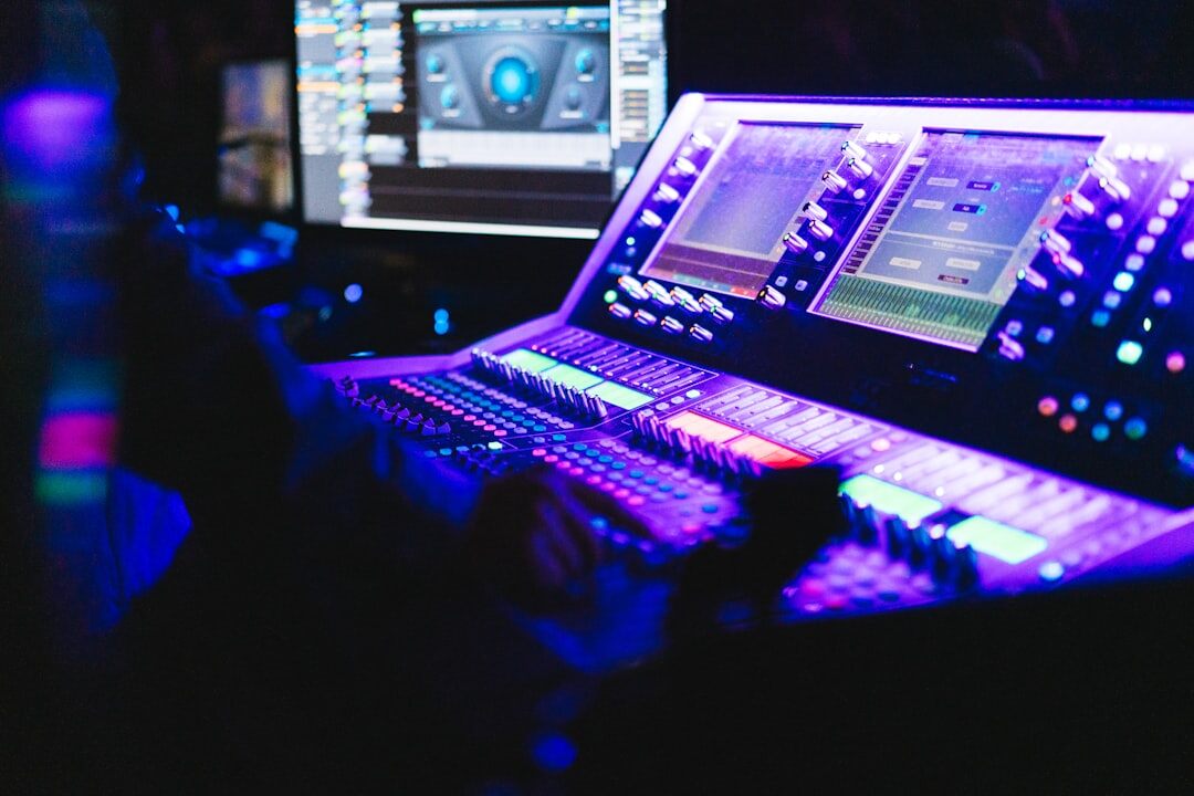 Broadcast control room with vision mixing desk and monitor wall